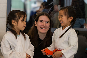 Sensei with 2 Douvris students in Karate Gi's