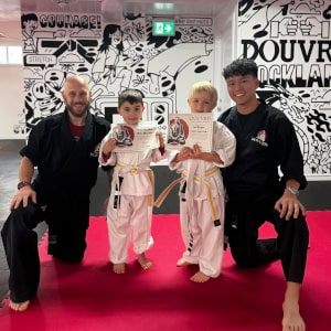 douvris_rockland-22-min Douvris Rockland owners with students who just earned their yellow belt