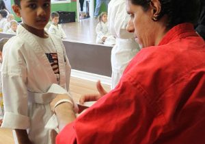 douvris-riverside-14 Riverside-South member with instructor tying belt